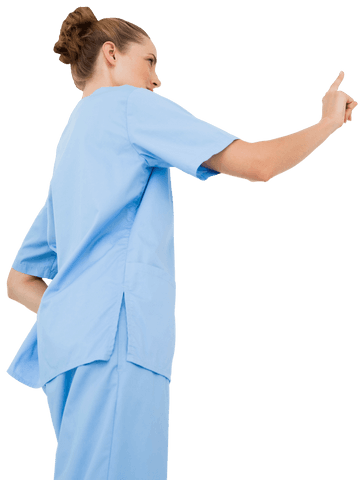Focused Female Doctor in Scrubs Gesturing on Transparent Background - Download Free Stock Videos Pikwizard.com