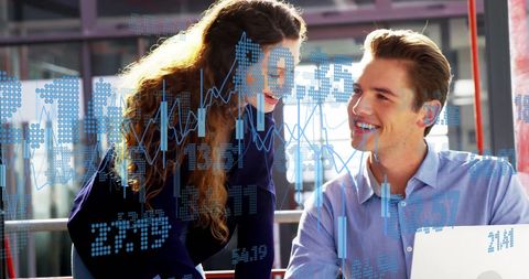 Collaborating Team Analyzing Digital Financial Data in Modern Office