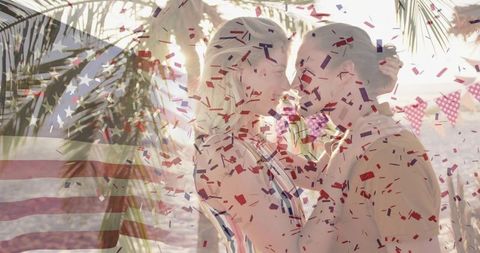 Romantic beach celebration with confetti and palm leaves for holiday fun