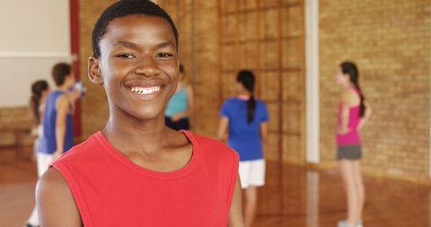 Confident Student Athletes Playing Basketball in Gymnasium - Download Free Stock Images Pikwizard.com