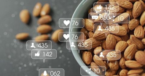Almonds with social media icons highlighting digital interaction and nutrition