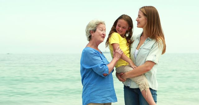 Three Generations of Women Enjoying Day at Beach - Download Free Stock Images Pikwizard.com