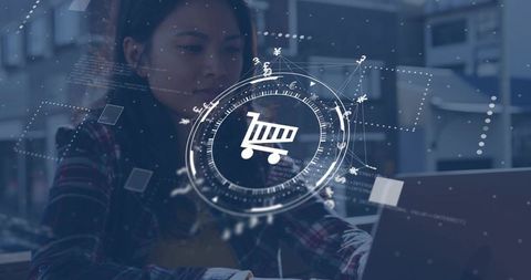 Woman activating fintech hud cart icon while analyzing e-commerce sales on laptop