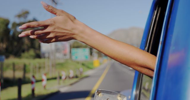 Hand Reaching Out of Car Window During Road Trip - Download Free Stock Images Pikwizard.com