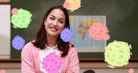 Smiling Teacher in Classroom Amidst New Hybrid Covid Learning