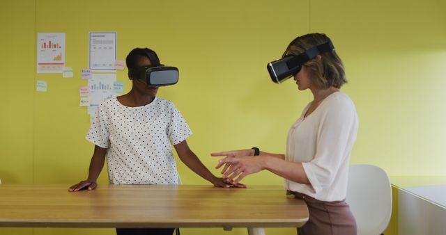 Team Collaborating with Virtual Reality Headsets in Modern Office - Download Free Stock Images Pikwizard.com