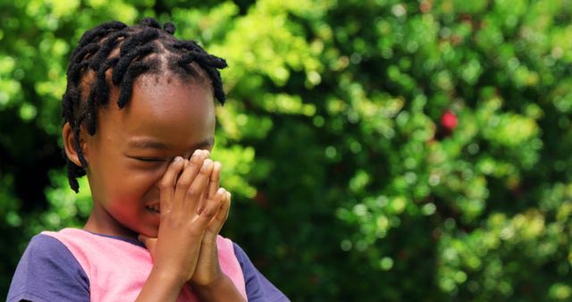 Joyful African American Child Playing Outdoors on a Sunny Day - Download Free Stock Images Pikwizard.com