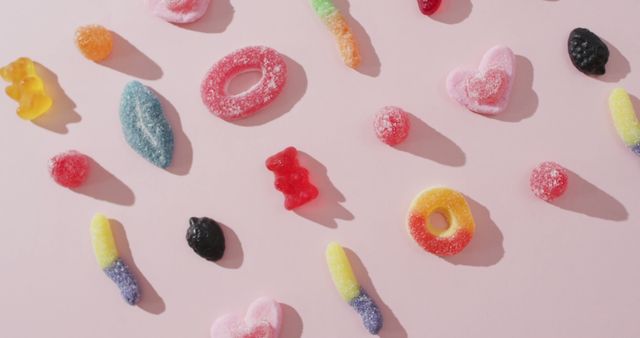 Assorted Gummy Candies on Pink Background - Download Free Stock Images Pikwizard.com