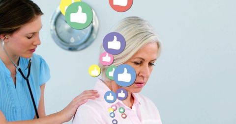 Nurse performing checkup on mature woman with thumbs-up icons showing patient satisfaction