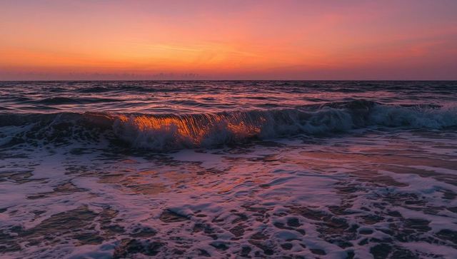 Dramatic Rolling Wave Catching Sunset Reflection on Seashore