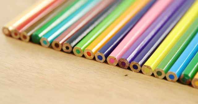 Close-up of Vibrant Colored Pencils on Wooden Background - Download Free Stock Images Pikwizard.com