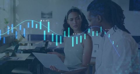 Coworkers Discussing Data Analytics in Modern Office Setting