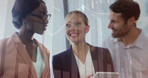 Diverse business professionals analyzing financial data with technology