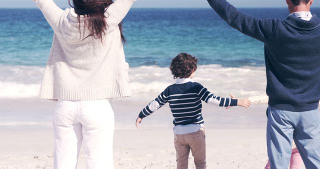 Family Enjoying Beach Vacation with Open Arms - Download Free Stock Images Pikwizard.com