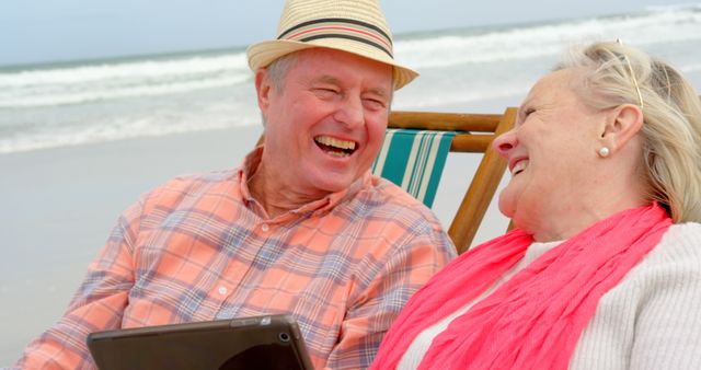 Happy Senior Couple Enjoying Time on Beach - Download Free Stock Images Pikwizard.com