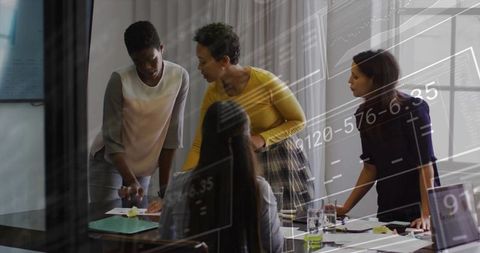 Businesswomen in Collaborative Teamwork on Financial Strategy