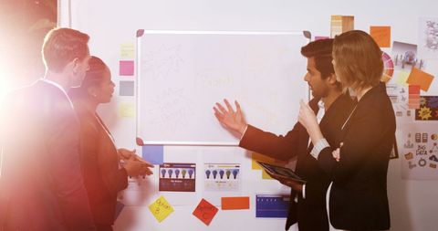 Diverse Team Brainstorming Creative Ideas at Night Office