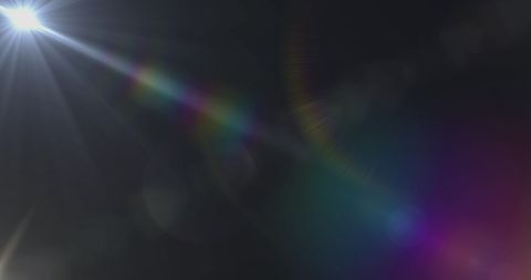 Hypnotic Colorful Light Lens Flare on Dark Background - Download Free Stock Images Pikwizard.com