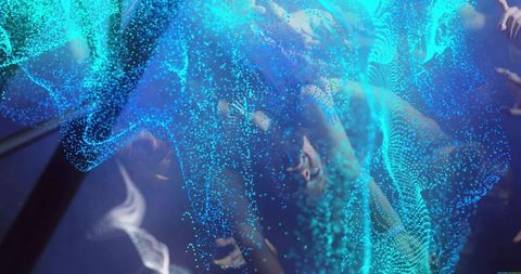 Enveloping figure with flowing cyan particles in digital space