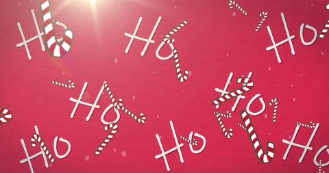 Falling candy canes and ho ho ho text on festive red background
