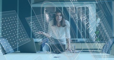 Female executive leading boardroom presentation with holographic data overlays and analytics