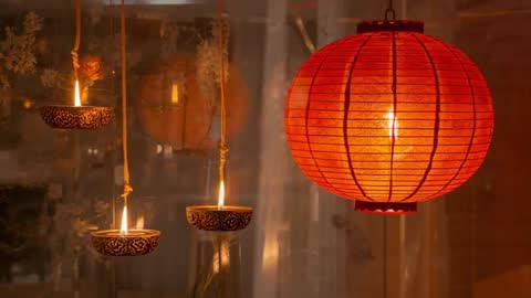 Red Paper Lantern Flickering with Hanging Oil Lamps Swaying in Candlelit Window Display