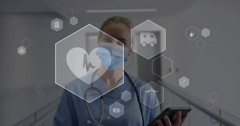 Qualified nurse utilizing digital healthcare technology in hospital