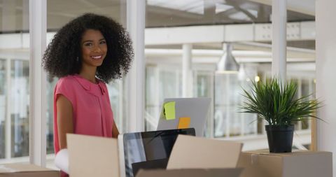 Confident Biracial Businesswoman Working in Modern Office
