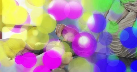 Contactless card tapping at pos with colorful bokeh overlay retail checkout transaction