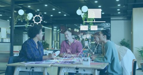 Diverse Colleagues Discussing Business Strategy with Digital Interface