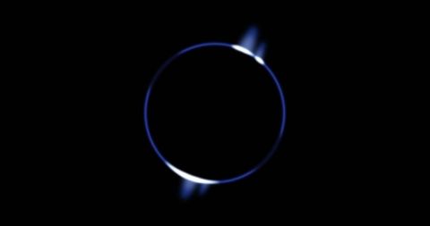 Glowing blue circle on black background movement energy