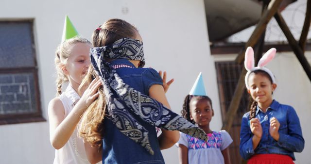 Playful Kids at Outdoor Party with Blindfold Game - Download Free Stock Images Pikwizard.com