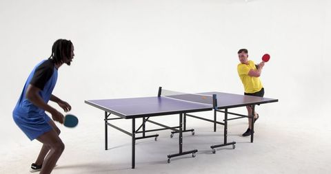 Dynamic Table Tennis Match in Minimalist Studio