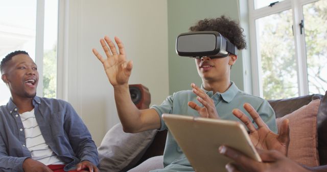 Friends Enthusiastically Engaging with VR Technology Indoors - Download Free Stock Images Pikwizard.com