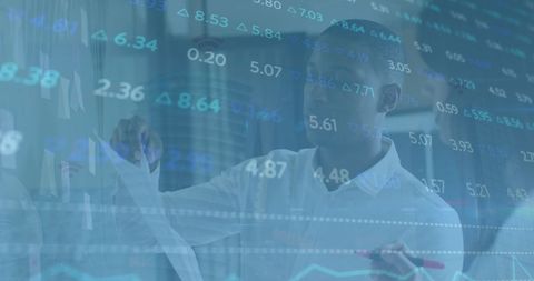 Business Analyst Examining Financial Data Over Digital Interface