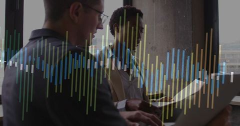 Corporate Colleagues Analyzing Data with Technology Overlay