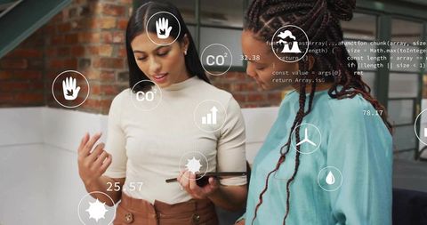 Business Professionals Analyzing Data on Tablet with Graphics