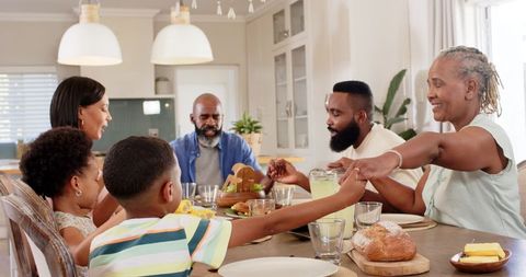 Family Celebrating Togetherness at Cozy Dining Table