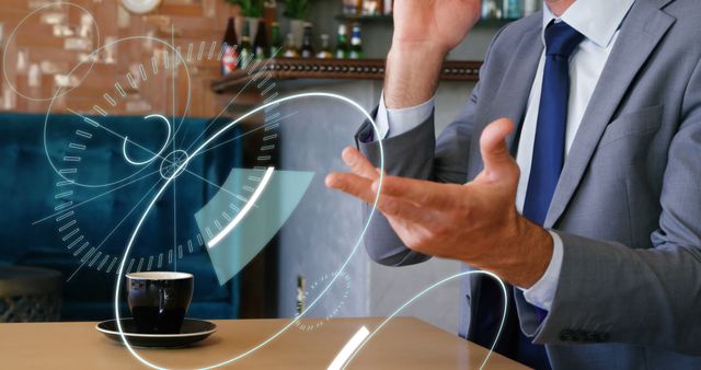 Businessman Interacting with Futuristic Digital Interface in Modern Cafe - Download Free Stock Images Pikwizard.com