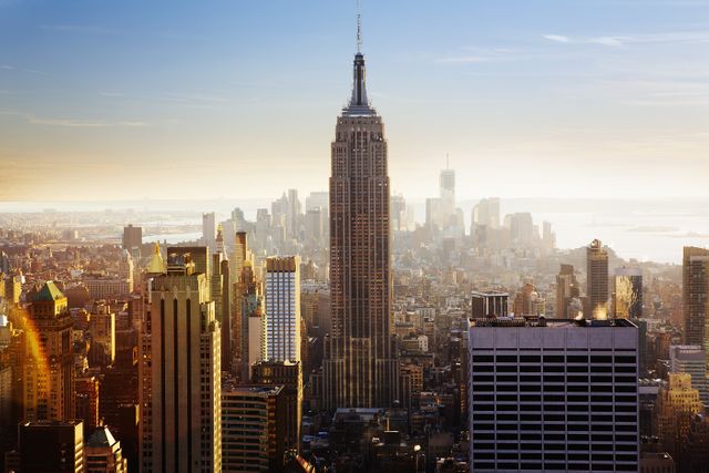 Empire State Building at Sunrise with New York City Skyline - Download Free Stock Photos Pikwizard.com