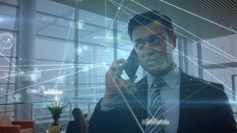 Businessman Surrounded by Digital Network Connections