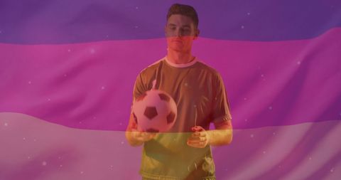 Football player with germany flag overlay reflecting with ball