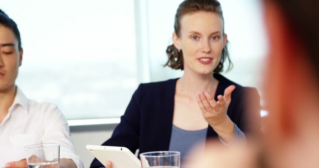 Female Business Leader Speaking During Team Meeting - Download Free Stock Images Pikwizard.com