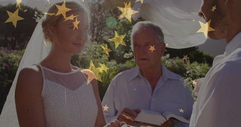 Garden wedding vows at golden hour with bride, groom, officiant and gold star overlay