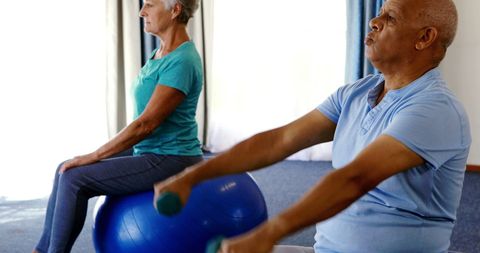 Senior Citizens Exercising with Dumbbells for Fitness at Home - Download Free Stock Images Pikwizard.com