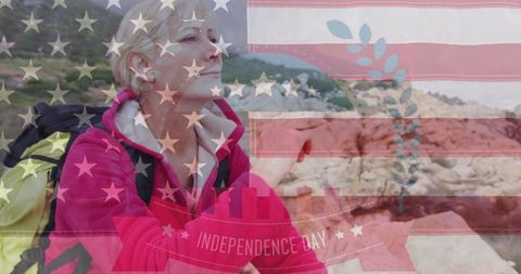Independence day celebration with reflective senior woman outdoors