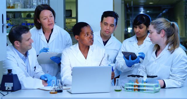 Diverse Team of Scientists Collaborating in Modern Laboratory - Download Free Stock Images Pikwizard.com