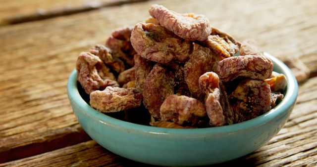 Dried Figs in Blue Bowl on Rustic Wooden Table - Download Free Stock Images Pikwizard.com