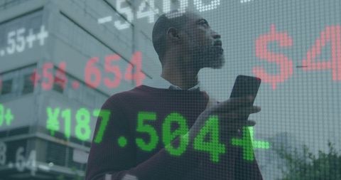 Businessman Analyzing Stock Market Data on Smartphone in Urban Environment