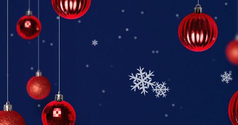 Hanging Red Christmas Baubles on Festive Blue Background - Download Free Stock Images Pikwizard.com